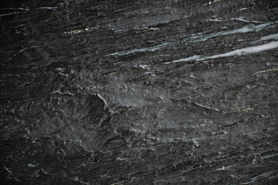 Close-up of dark polished granite stone