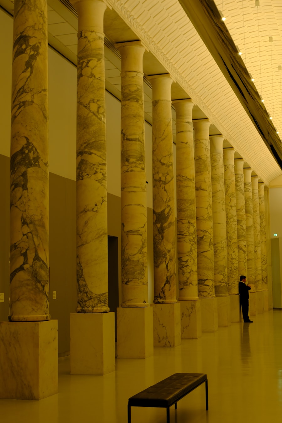 Row of marble columns lining a grand hallway
